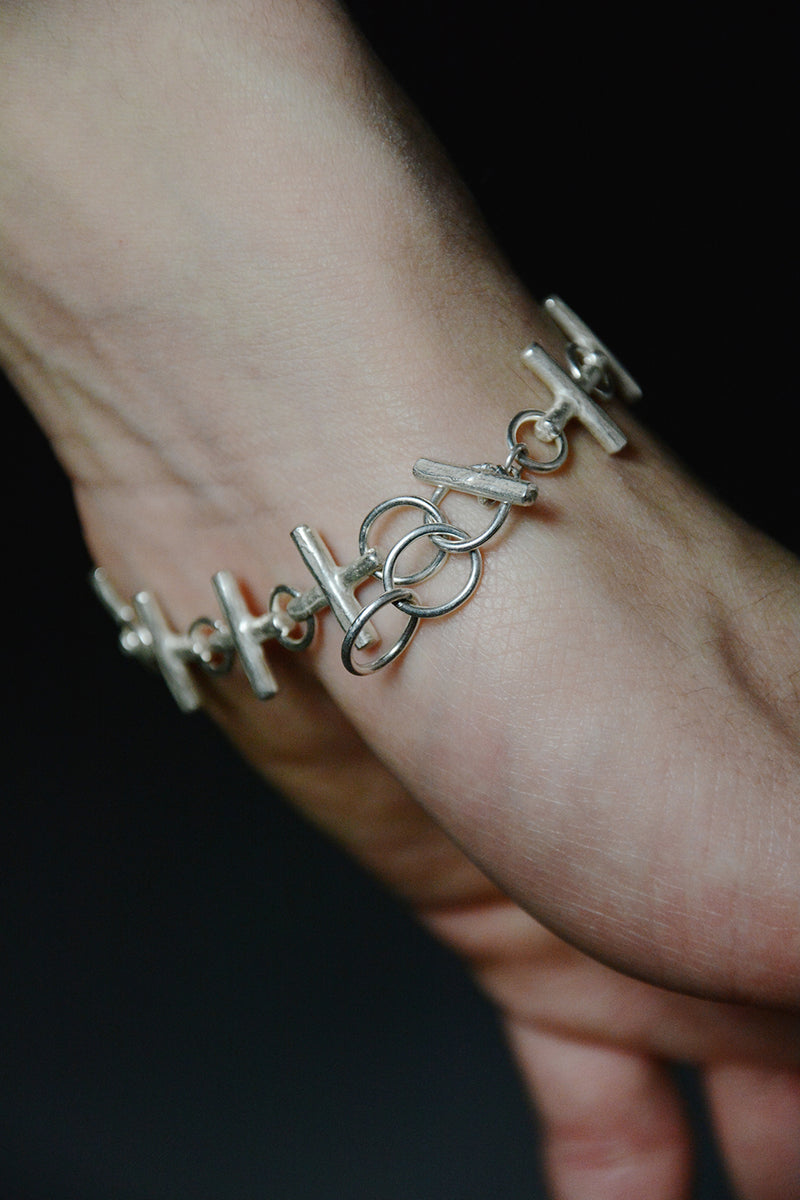 MULTIPLE CROSS SILVER BRACELET