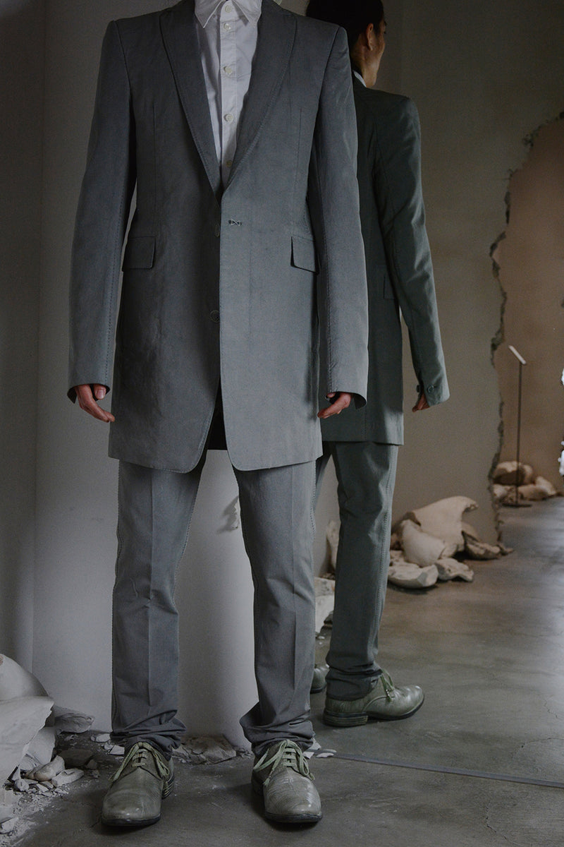 OBJECT DYED UNLINED, VISIBLE MELTLOCK, ELONGATED 2 BUTTON JACKET