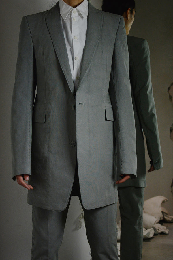 OBJECT DYED UNLINED, VISIBLE MELTLOCK, ELONGATED 2 BUTTON JACKET