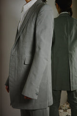 OBJECT DYED UNLINED, VISIBLE MELTLOCK, ELONGATED 2 BUTTON JACKET