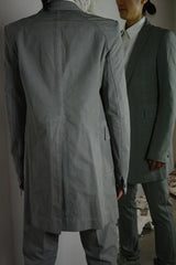 OBJECT DYED UNLINED, VISIBLE MELTLOCK, ELONGATED 2 BUTTON JACKET