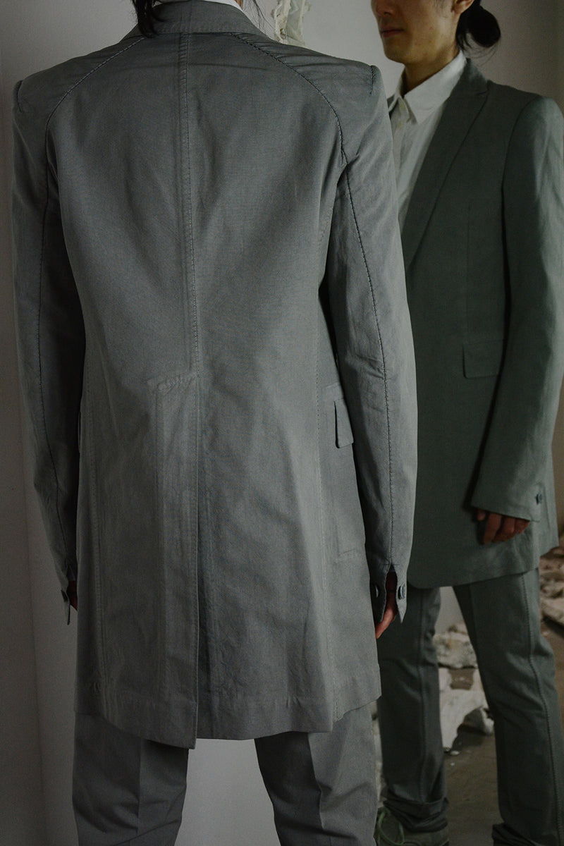 OBJECT DYED UNLINED, VISIBLE MELTLOCK, ELONGATED 2 BUTTON JACKET