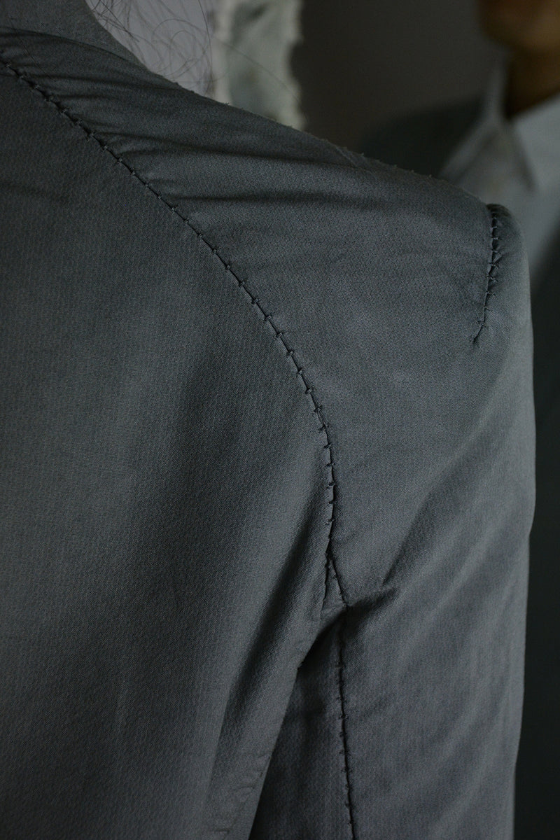 OBJECT DYED UNLINED, VISIBLE MELTLOCK, ELONGATED 2 BUTTON JACKET