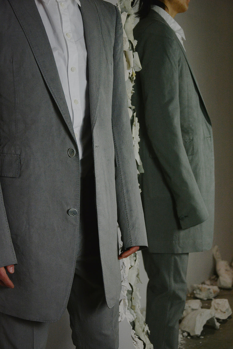 OBJECT DYED UNLINED, VISIBLE MELTLOCK, ELONGATED 2 BUTTON JACKET