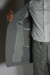 OBJECT DYED UNLINED, VISIBLE MELTLOCK, ELONGATED 2 BUTTON JACKET