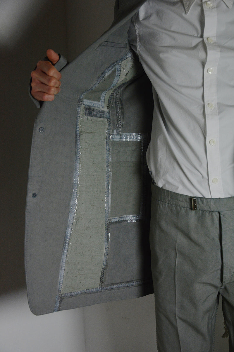 OBJECT DYED UNLINED, VISIBLE MELTLOCK, ELONGATED 2 BUTTON JACKET